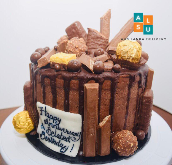 Dark Chocolate cake with Chocolates Overloaded
